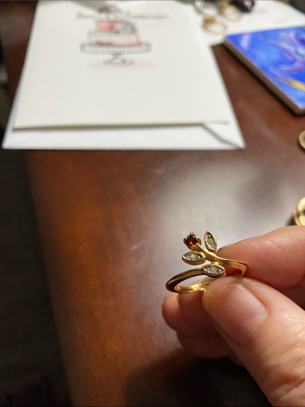 Gold Floral Leaf Ring with Red Gemstone